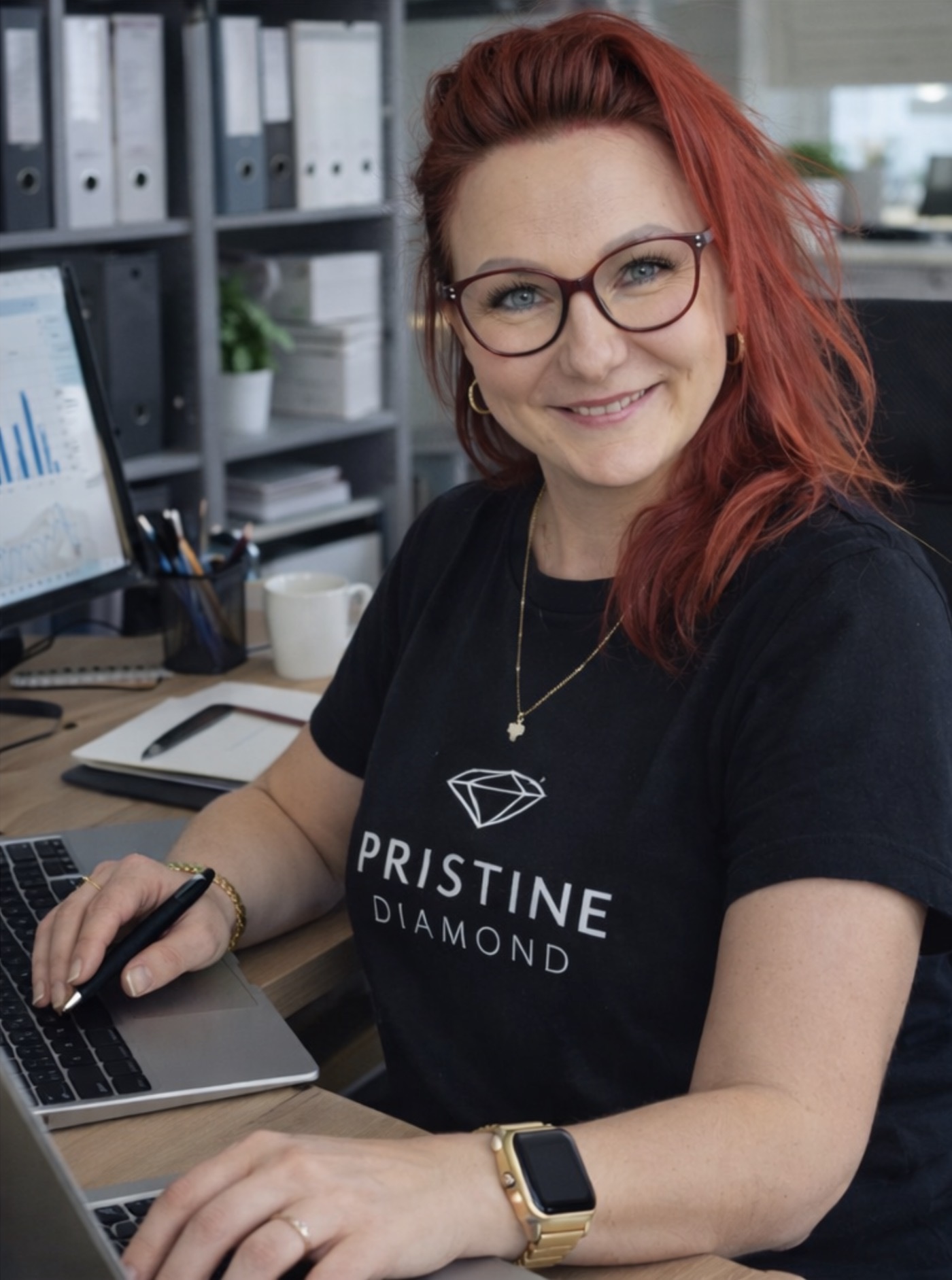 Anna, founder of Pristine Diamond Cleaning, working at her desk